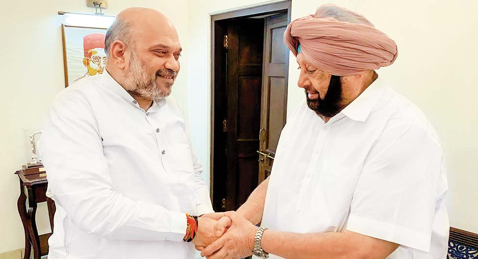 गृहमंत्री अमित शाह से मिलते अमरिंदर गृहमंत्री अमित शाह से मिलते अमरिंदर